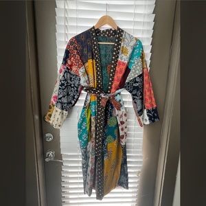 Indian robe made from a patchwork of repurposed saris pieced together